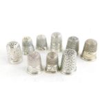 A collection of silver thimbles, of varying dates and designs, 1¼oz.