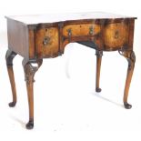 A burr walnut dressing table in mid 18thC style, the crossbanded inverted breakfront top above a fri