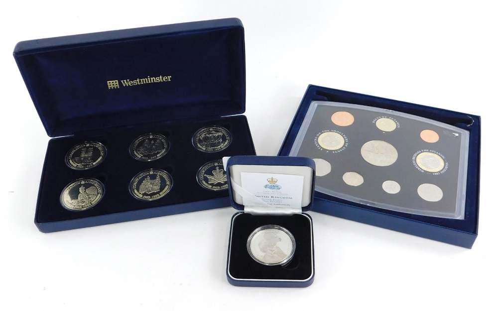 A United Kingdom silver proof Golden Wedding Anniversary five pound coin, issued by Coningsby Intern