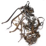 A quantity of horse tack, etc., to include wooden and iron hames, leather bridle, etc.