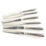 A set of six George V silver handled butter knives, Sheffield 1928.