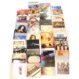 A quantity of LP records, to include Yes, Frankie Goes to Hollywood, Slade, Boomtown Rats, Eagles, P