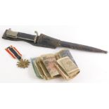 A German bayonet, the blade stamped Rich.Abr.Herber Solingen, with leather scabbard, a Third Reich 1