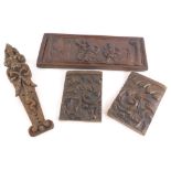 A carved oak jamb, decorated with a gentleman, scrolls, etc., two carved oak panels and a rectangula