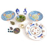 Miscellaneous oriental items, to include a 19thC Chinese plate, decorated in red, green and blue, (A