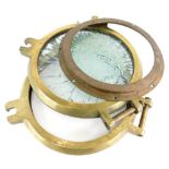 Two brass ships portholes. (AF)