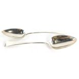 A pair of George III Old English pattern silver serving spoons, London 1805, 4¼oz, 22cm long.