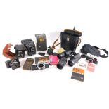 Miscellaneous items, to include a Russian Lomo camera, a Pentacon lens, binoculars, cameras, etc.