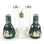 A collection of silver collared vases, bottles, etc., to include a pair of cut glass bottle shaped v