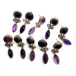 Five pairs of silver and purple stone set drop earrings, each with 3cm drop, 38.3g all in.