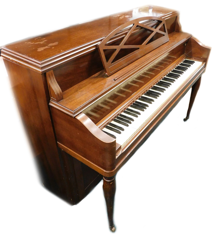 A Heintzman upright grand piano, in a walnut case, with simulated ivory keys, on baluster turned leg