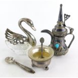 A collection of white metal items, to include an open salt with clear glass liner, marked 800 to bas