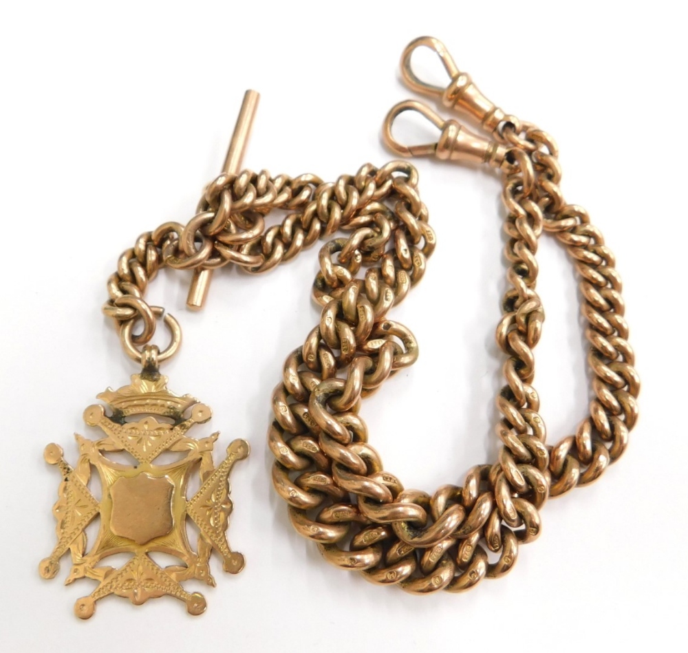 A 9ct gold watch chain, the curb link watch chain with two clip ends, t-bar and additional chain dro