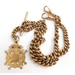 A 9ct gold watch chain, the curb link watch chain with two clip ends, t-bar and additional chain dro