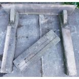 A hewn stone fire surround, comprising mantel and sides, etc., (AF), 150cm wide.