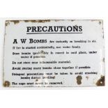 An original Second World War enamel sign, for A W Bombs, detailing precautions, (AF), 20cm x 30cm.