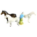 A collection of Beswick, to include a Connemara pony, a Welsh mountain pony, a brown horse and a Bud