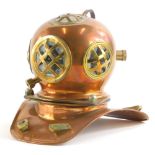 A copper and brass model of a diver's helmet, 18cm high.