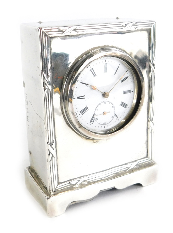 An Edward VII silver cased desk clock, by Henry Matthews, with an enamel Roman numeric dial, Birming