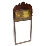 A 19thC mahogany walnut wall mirror, with shaped crest above a panel painted with a river landscape