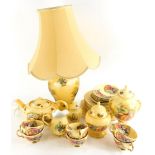 A collection of Aynsley Orchard Gold ceramics, to include lamp base, vase and cover, teapot, etc.