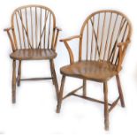 Two similar 19thC ash and elm Windsor chairs, each with a shaped back, spindle turned supports, a so
