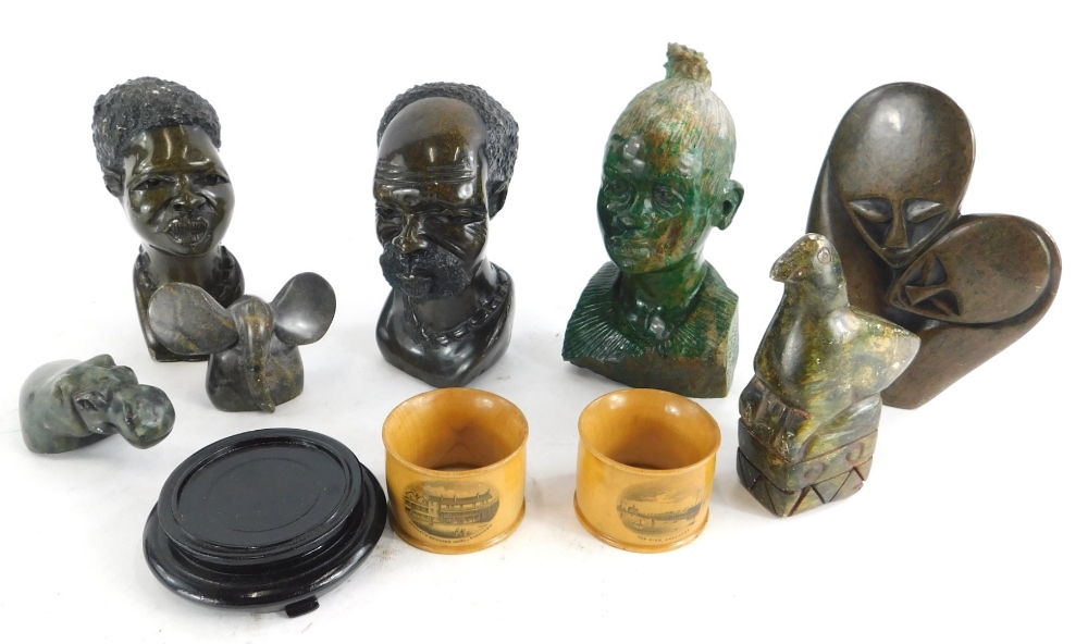 Miscellaneous African souvenirs, to include a carved stone bust, figures, and a pair of Mauchline wa