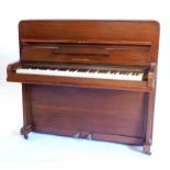 A mahogany upright piano by Monington and Weston, with plain end supports and castors, 120cm wide.