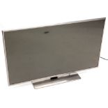 An LG 42" LCD TV, with remote and lead.