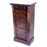 A Victorian oak Wellington chest, with seven drawers, each with turned wood handles, on a plinth, 10