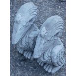 A pair of composition Wally bird type garden ornaments, 41cm high.