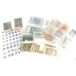 Approximately sixty German banknotes and a quantity of coins, all pre 1940.