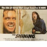 A film poster for the Stanley Kubrick film The Shining, with slogan The Tide of Terror That Swept Am