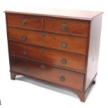 An early 20thC mahogany chest of drawers, the top with a moulded edge, above two short and three lon