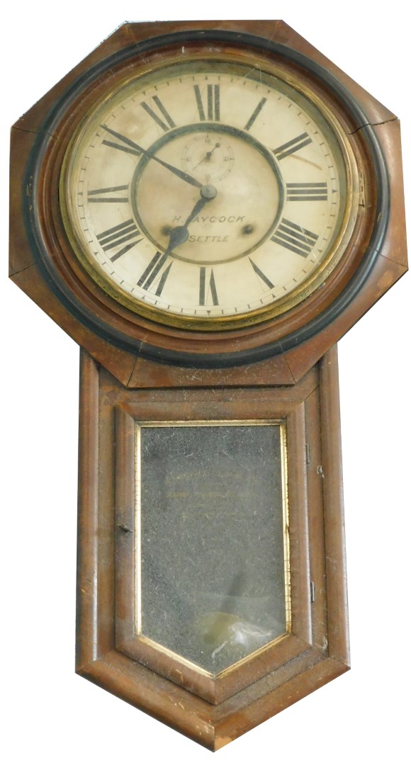 A late 19thC American drop dial wall clock, in a walnut case, the paper dial signed H Laycock Settle