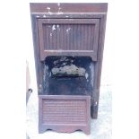 A small late 19th/early 20thC cast iron fireplace, with reeded and beaded decoration, registration n