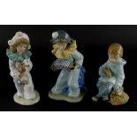 Two similar Nao Pierrot porcelain figures, modelled in the form of a child playing an instrument and