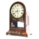 A Victorian rosewood and mother of pearl inlaid mantel clock, painted with numerals and bearing the