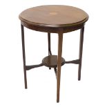An Edwardian mahogany and boxwood strung occasional table, the circular top with a central inlaid pa