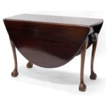 A mahogany and beech drop leaf table, the oval top with a moulded edge, on cabriole legs with ball a