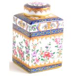 A continental porcelain square section tea caddy and lid, decorated in Chinese armorial style, unmar