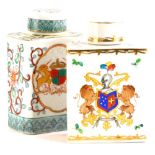 Two continental porcelain Chinese armorial style tea caddies and covers, each decorated with a crest