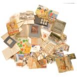 A quantity of ephemera, to include postcards, cigarette cards, playing cards, school books, biology