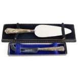 Two items of small silver, to include a silver handled cheese knife with stainless steel blade, Shef