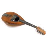 A Neapolitan mandolin, bearing label for Carlo Cristini Naples, 61cm long.