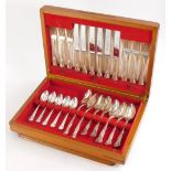 A canteen of silver plated cutlery, for six place settings, in an oak case.