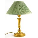 A late 19th/early 20thC French gilt metal lamp base, with fluted column cast with leaves, etc., 44cm