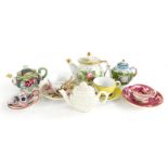 A collection of miniature porcelain, to include a German teapot and cover stamped SPM, chamber stick