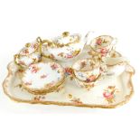 A Hamersley and Co cabaret tea set, comprising teapot and cover, two handled covered sugar bowl,