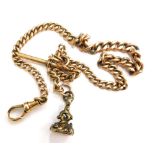 A rose gold watch chain, with later yellow gold clip and t-bar, unmarked, with gold plated seal stam